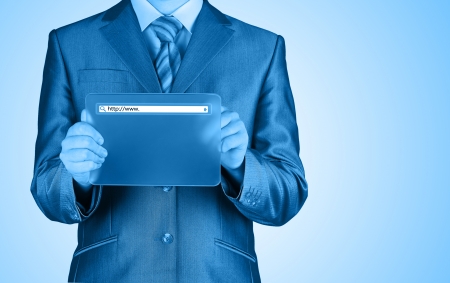 Businessman pushing virtual search barの写真素材