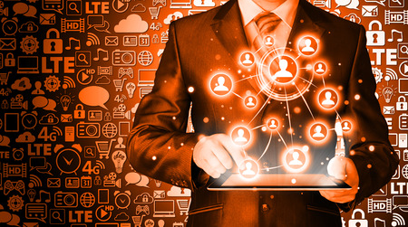 Business man using tablet PC social connectionの写真素材