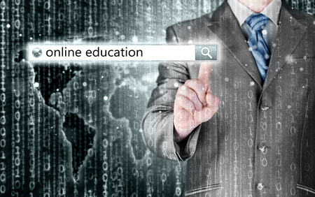 Online education written in search bar on virtual screen.の写真素材