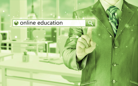 Online education written in search bar on virtual screen.の写真素材