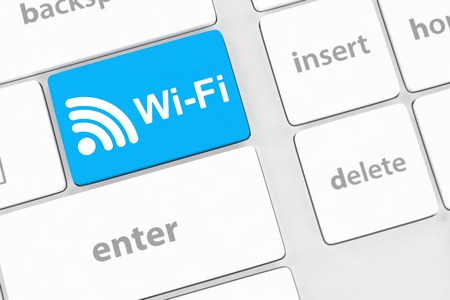 wifi concepts, with message on enter key of computer keyboard.の写真素材