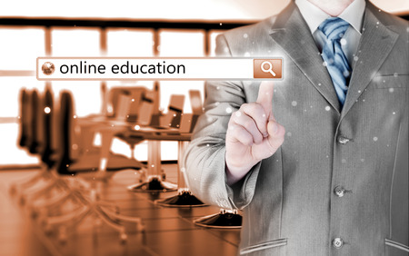 Online education written in search bar on virtual screen.の写真素材