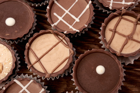 Dark chocolate on wooden background