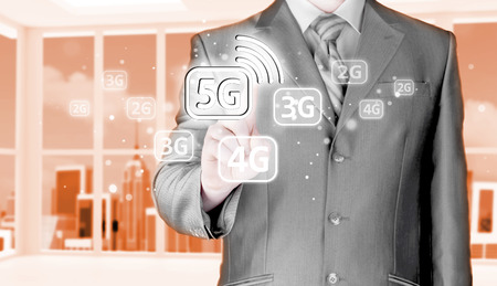businessman holding in hand 5G, technology backgroundの写真素材