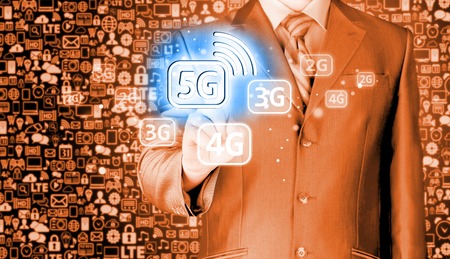 businessman holding in hand 5G, technology backgroundの写真素材