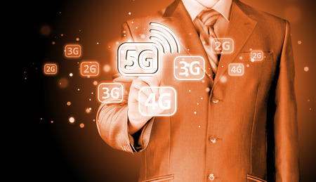 businessman holding in hand 5G, technology backgroundの写真素材
