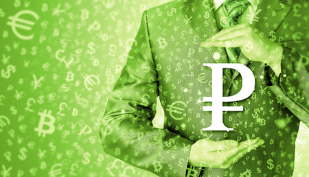 businessman protecting ruble symbolの写真素材