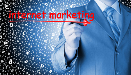 business man writing internet marketingの写真素材