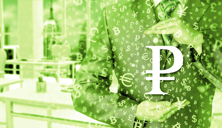 businessman protecting ruble symbolの写真素材