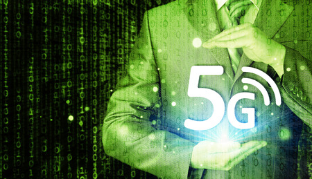 businessman holding in hand 5G, technology backgroundの写真素材