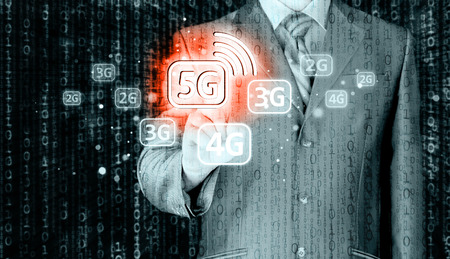 businessman holding in hand 5G, technology backgroundの写真素材