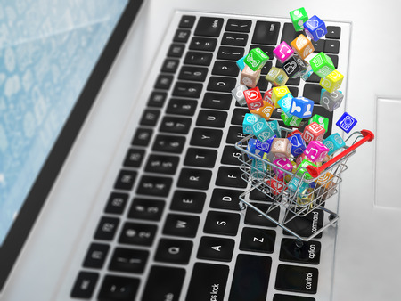 shopping cart with application software icons on laptopの写真素材