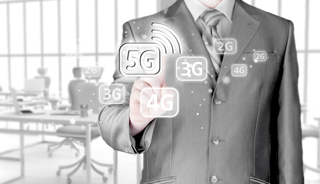 businessman holding in hand 5G, technology backgroundの写真素材
