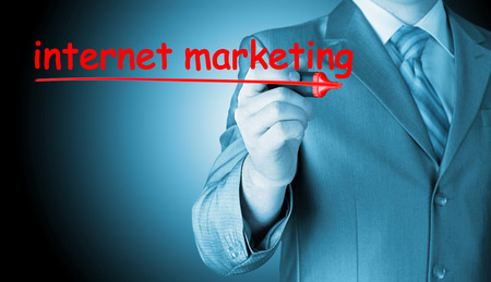 business man writing internet marketingの写真素材