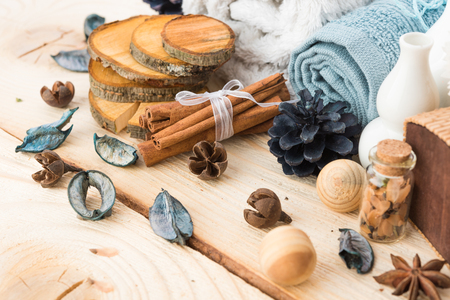 spa stuff, cinnamonand flower with towel on woodの写真素材