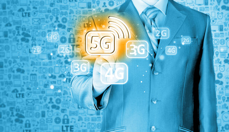 businessman holding in hand 5G, technology backgroundの写真素材