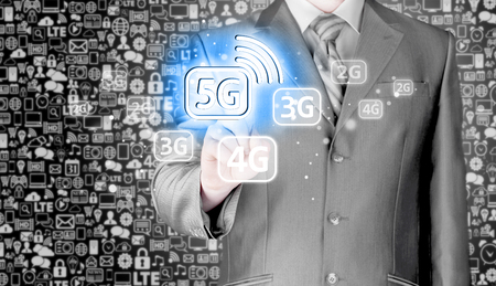 businessman holding in hand 5G, technology backgroundの写真素材