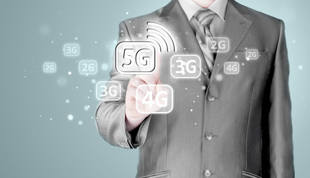 businessman holding in hand 5G, technology backgroundの写真素材