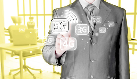 businessman holding in hand 5G, technology backgroundの写真素材