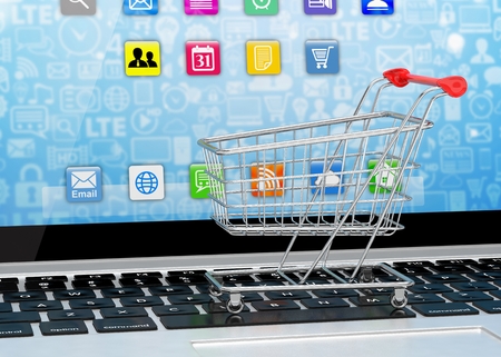 Shopping cart on laptop.の写真素材