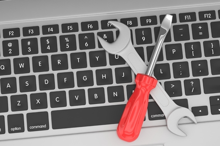 3D Illustration Wrench and screwdriver on laptop, service conceptの写真素材