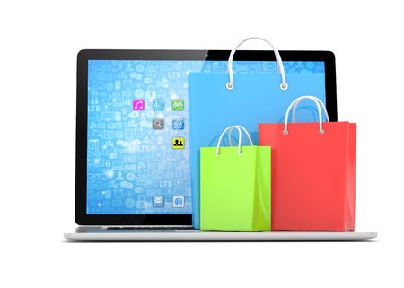 laptop and  shopping pags on white background. 3d rendering.の写真素材