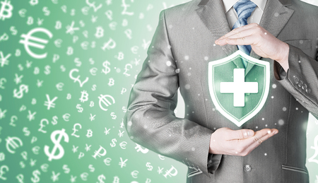 Health protection and insurance. Medical healthcare. Business in health safety. Money background. World currency.の写真素材