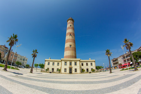 A portuguese lighthouse on the seaside of the atlantic oceanの写真素材