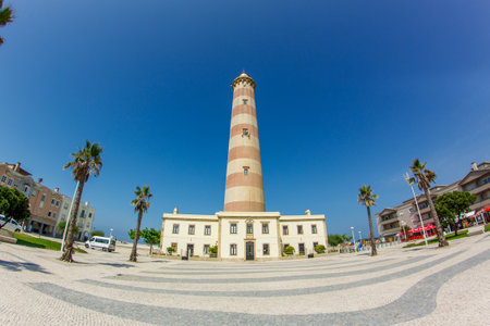 A portuguese lighthouse on the seaside of the atlantic oceanの写真素材