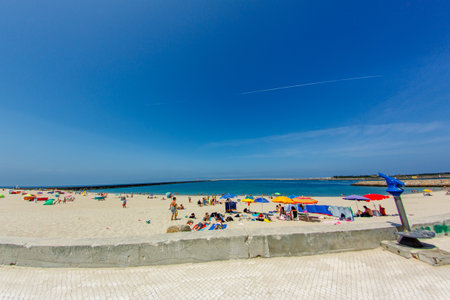 A lighthouse on the seaside of the atlantic oceanの写真素材