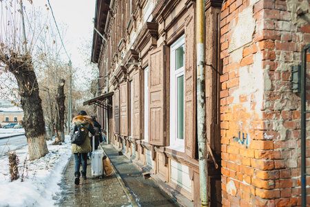 Chinese tourists in spring in a historical part of a Siberian cityの写真素材