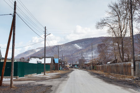 an ordinary street in a Russian Siberian village in springの写真素材
