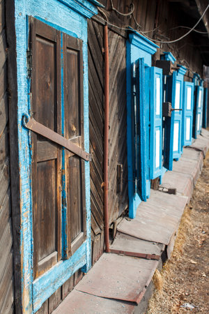 Shutters of a traditional Russian Siberian wooden houseの写真素材