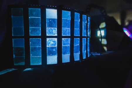 a blue floodlight at a disco
