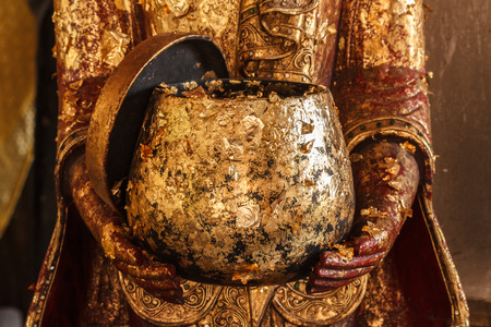 Golden alms bowl  の写真素材