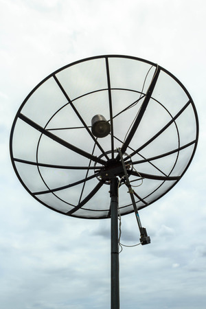 Satellite dish on cloudy day .の写真素材