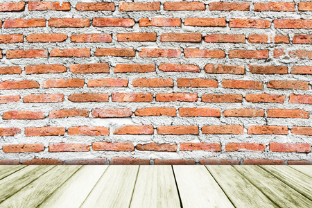 Wooden paving with brick wall.の写真素材