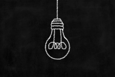 Chalkboard with Chalk Drawing of Hanging Light Bulb.の写真素材