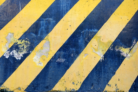 Old Black and Yellow Striped Caution Sign.の写真素材