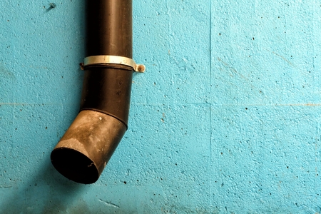 Old Drain Pipe on Concrete Wall.の写真素材