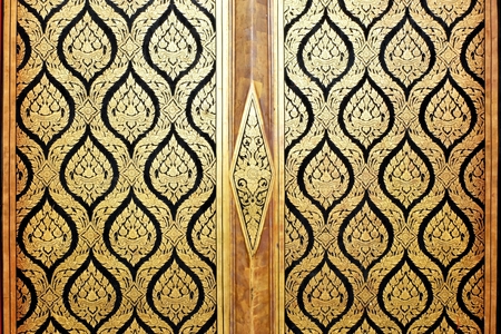Close up ancient temple door background.の写真素材