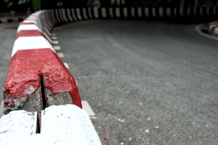 Red and White Traffic Concrete Barriers with Space for Text. (Selective Focus)の写真素材
