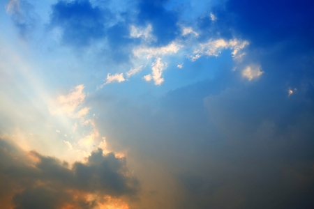 Sunlight Beam Shining Through the Heaven Blue Skies Background.の写真素材