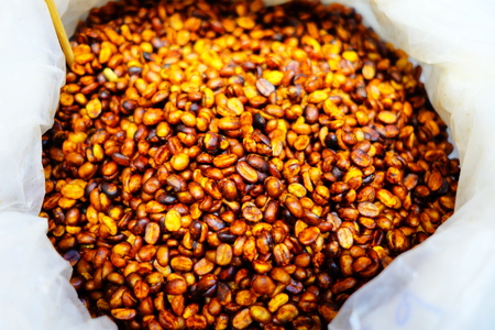 Coffee Beans in White Bag. (Selective Focus)の写真素材