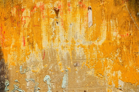 Old Grunge and Yellow Painted Concrete Wall Background.の写真素材