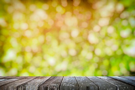 Empty Wooden Table with Bokeh of The Garden Background for Natural Concept, Suitable for...