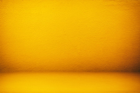 White Stucco Room Background in Fortuna Gold Color Tone, Suitable for Product Presentation Backdrop, Display, and Mock up.の写真素材