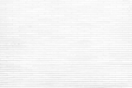 White Brick Wall Texture for Background with Light Beam from the Top.の写真素材