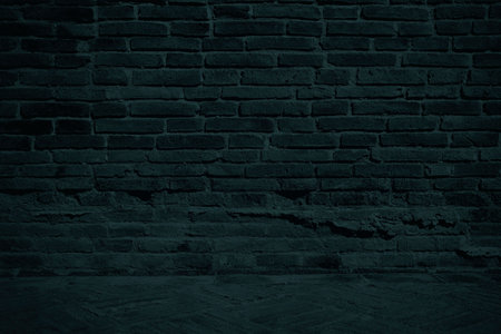 Dark Brick Wall Background with Brick Pavement.の写真素材