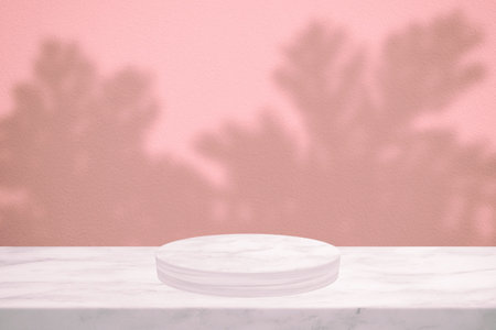 White Marble cylinder Podium with Shadow Leaves on Pink Concrete Wall Texture Background, Suitable for Product Presentation Backdrop, Display, and Mock up.の写真素材